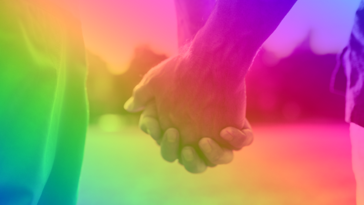 Rainbow hand holding